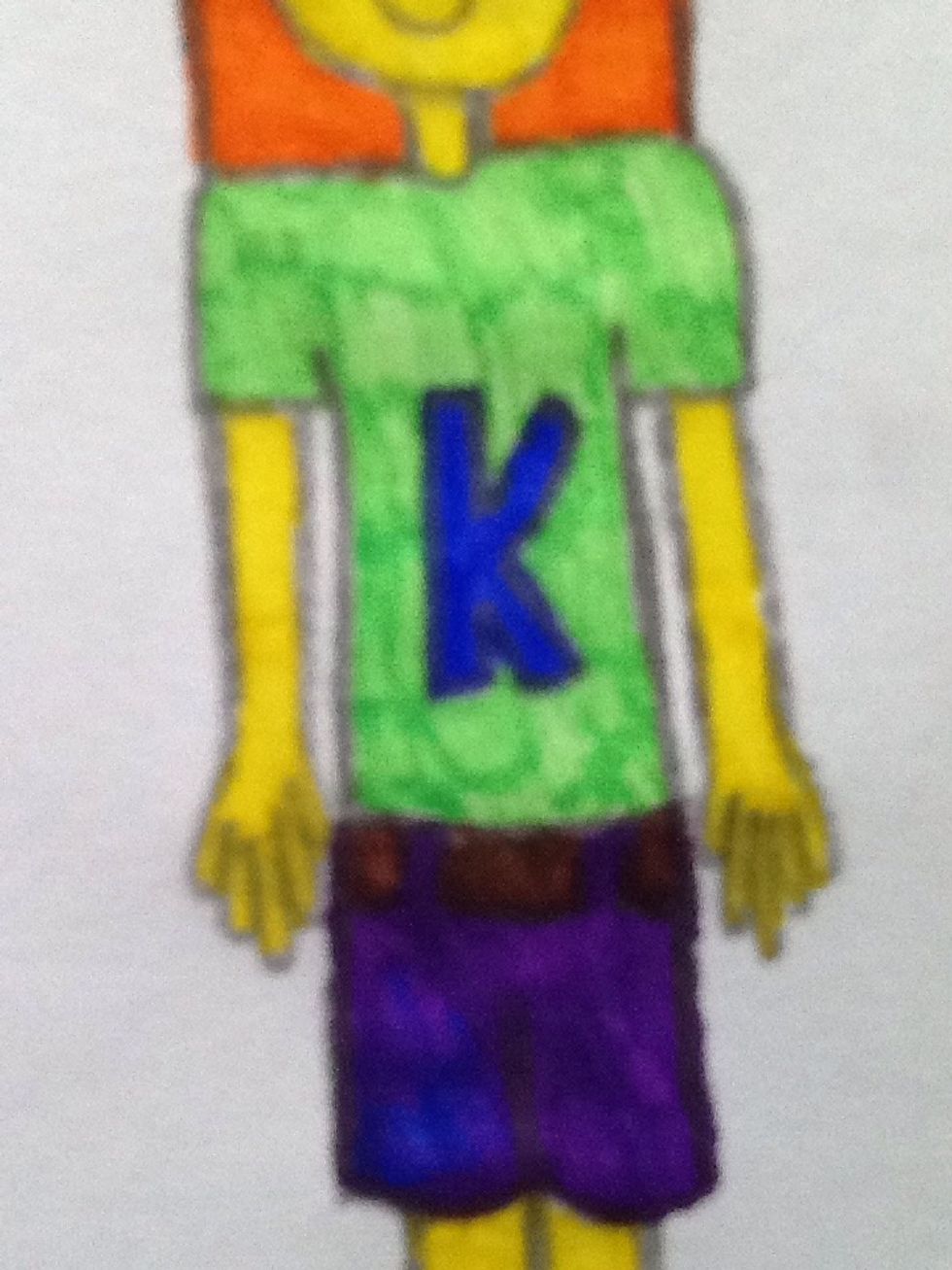 Start colouring in, now I've put a 'K' because she's called 'Kylie'