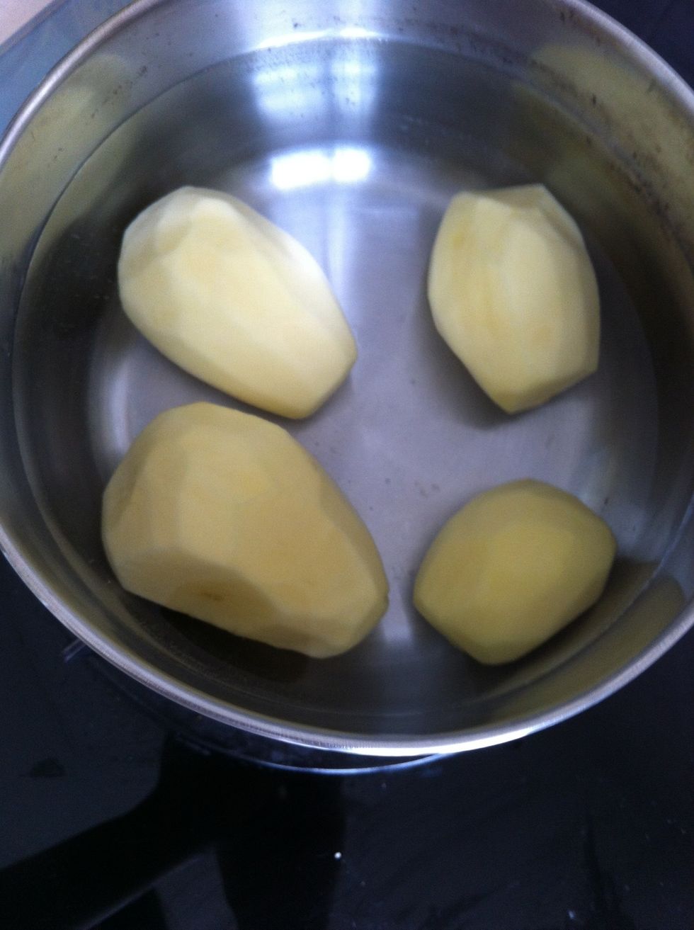 Start cook all the potatoes..**the water must fill up cover all the potatoes.