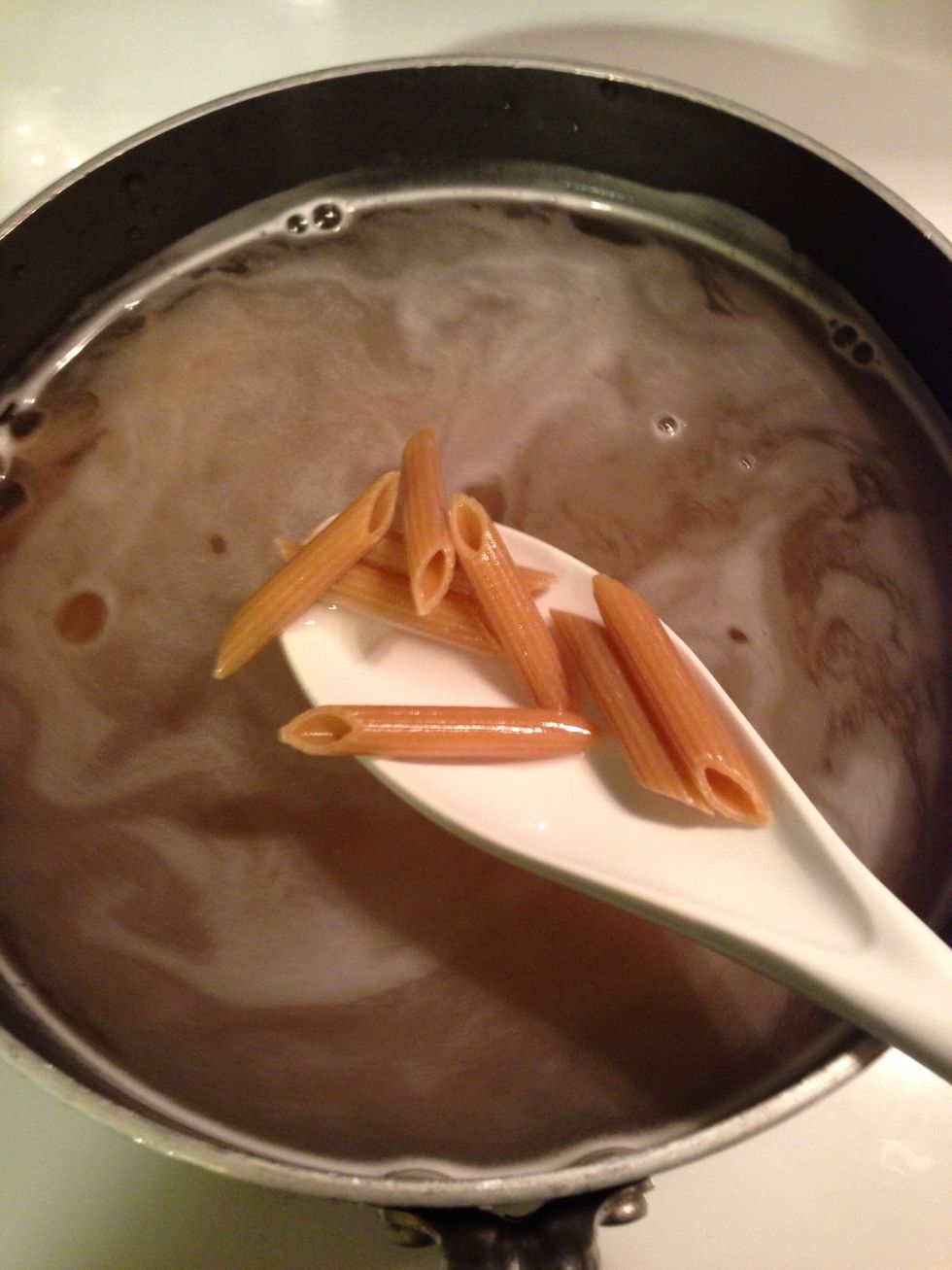 Start cooking pasta according to package