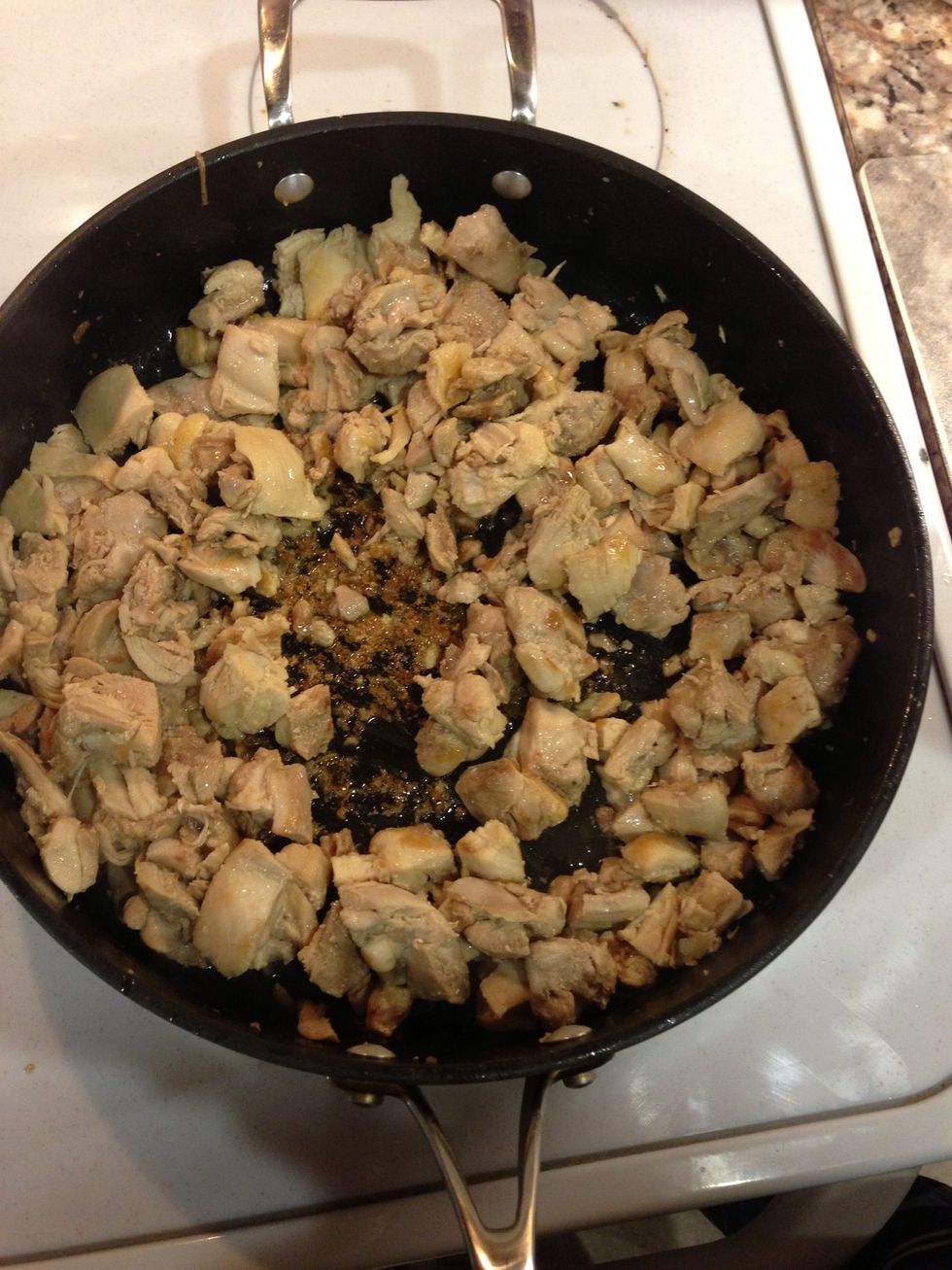 Start cooking the cut pieces until they begin to slightly brown on the outside. No lid needed.  MAKE SURE ALL THE RED IS GONE