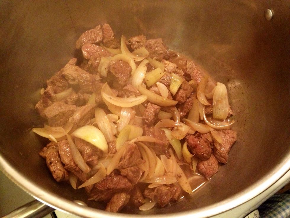 Start cooking the meat and onions.