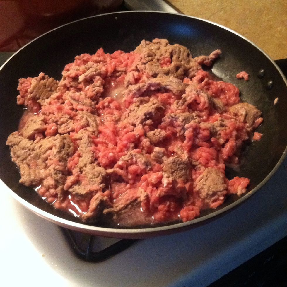 Start cooking your meat until it's completely done.