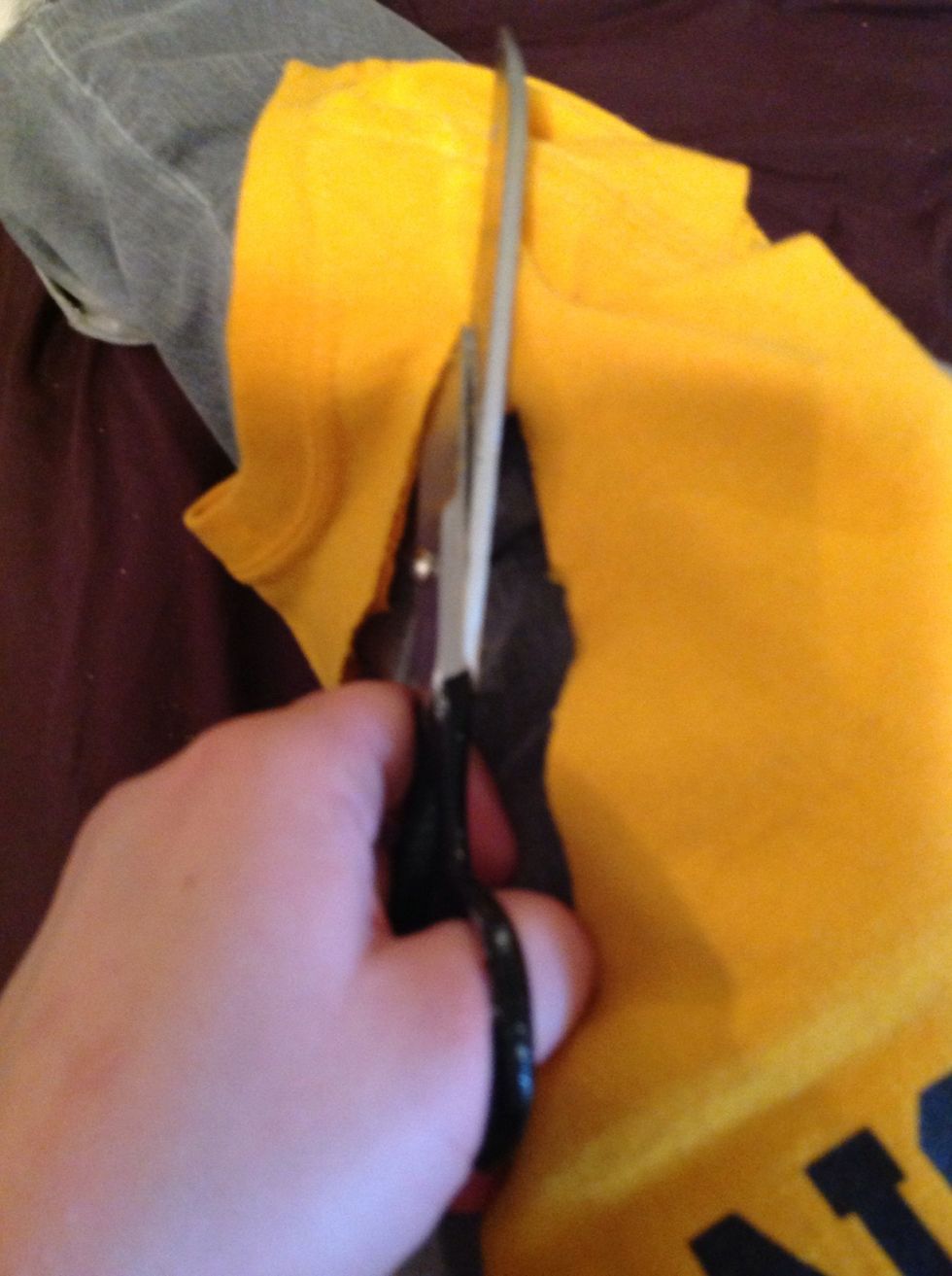 Start cutting along the shirt