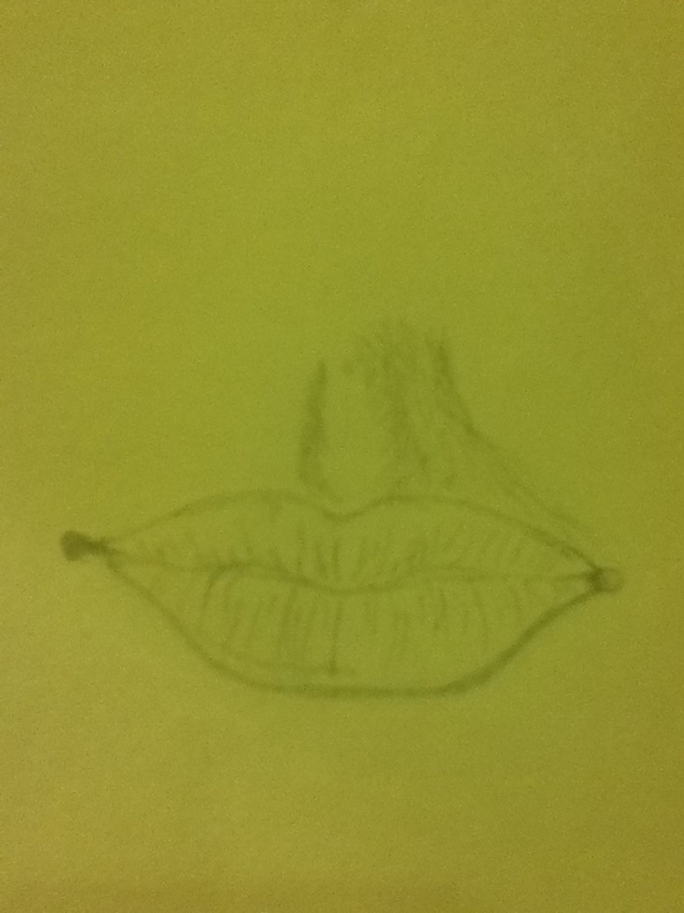 Start drawing the shape of the philtrum on the upper lip. (H pencil)