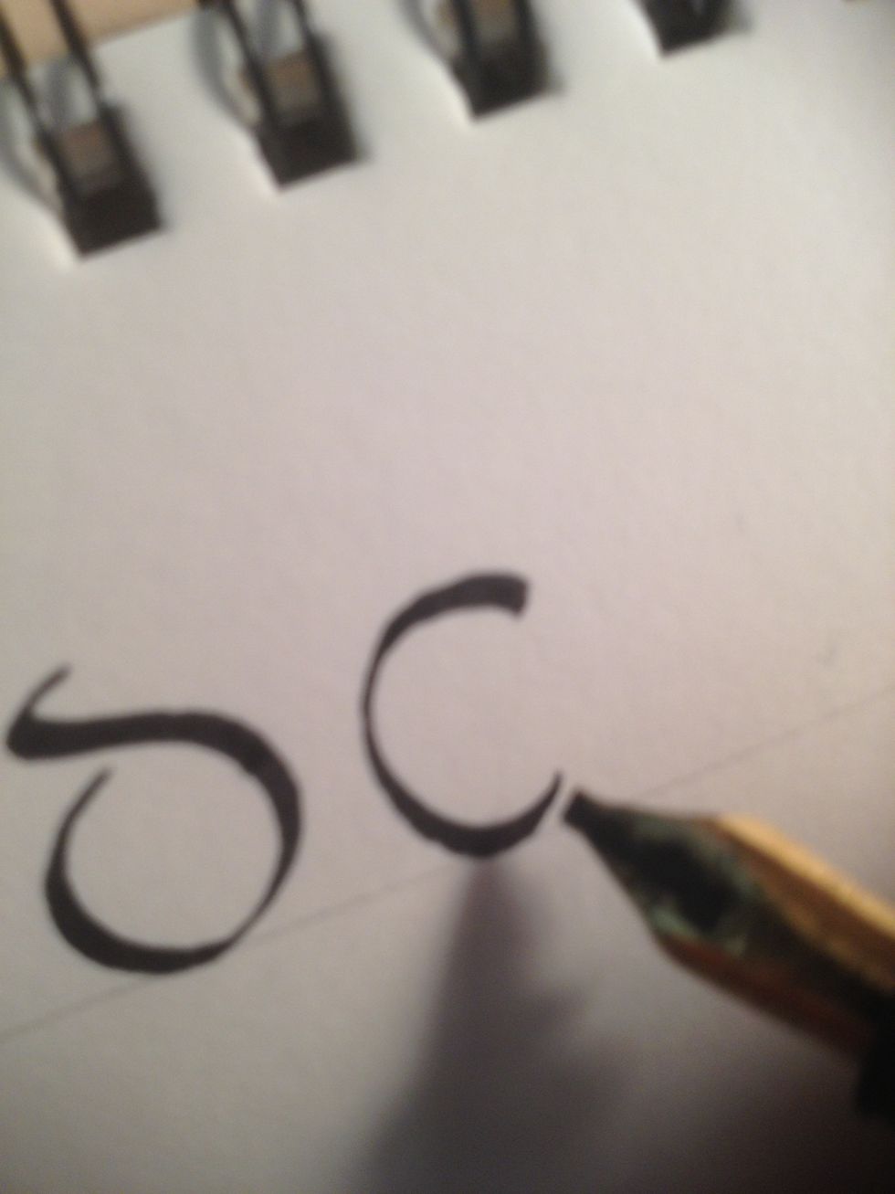 Start E off by making a Majuscule C.