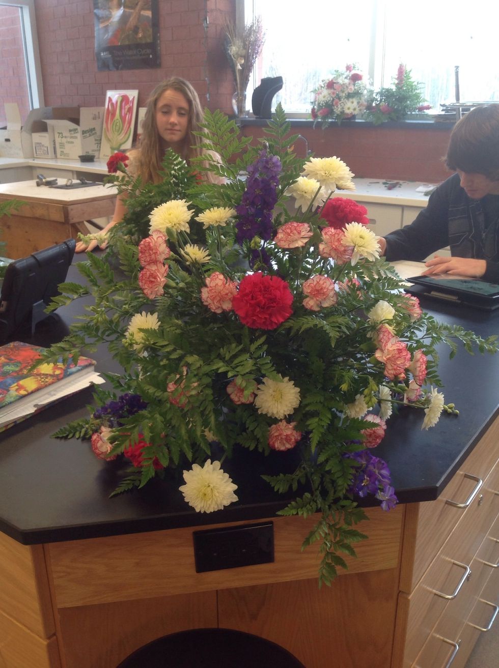 Start filling in some of the spaces with mini carnations