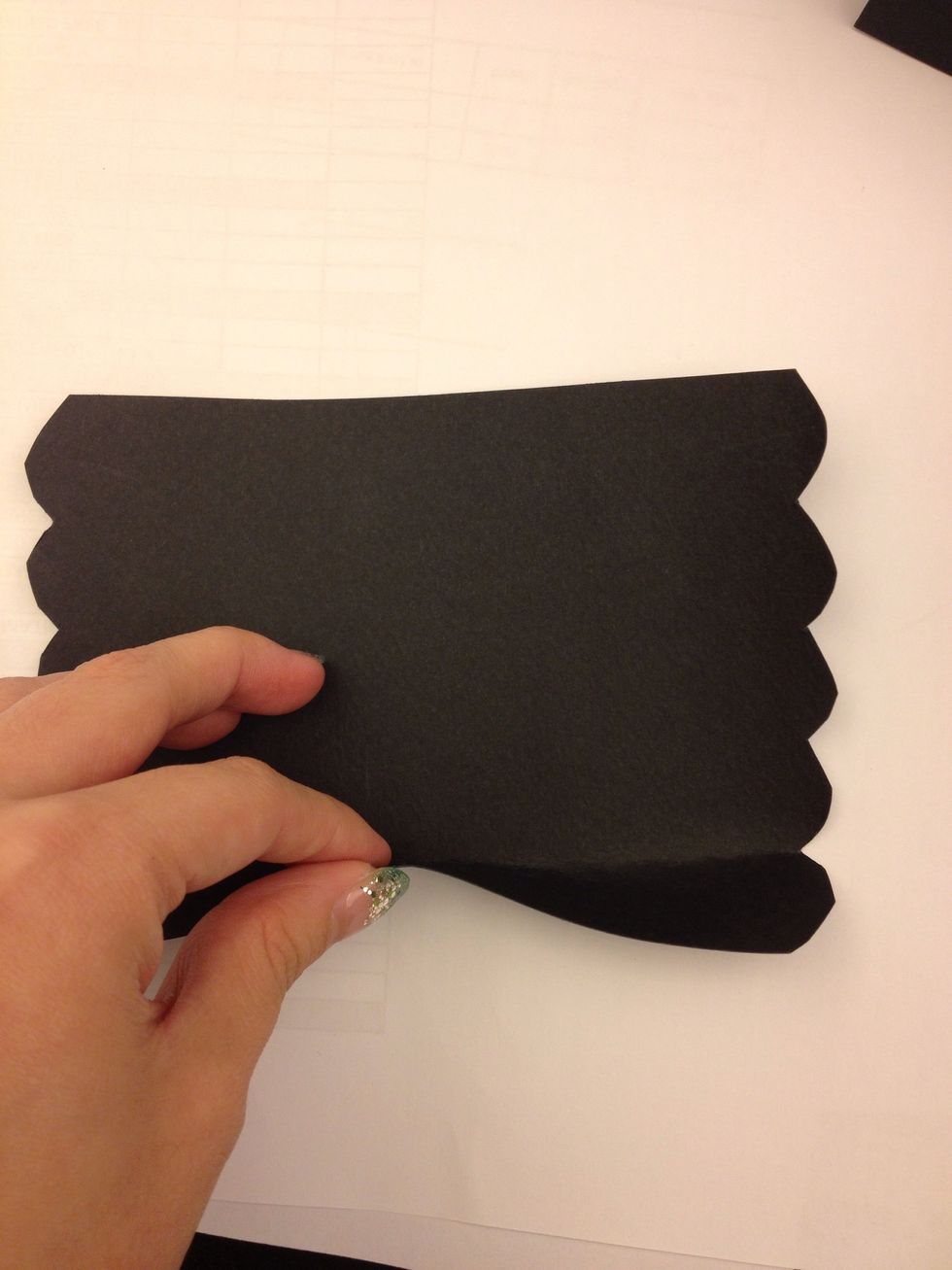 Start folding front and backwards, folding line start in centre, hold it , try not to fold so much towards the edges to achieve a neater bow