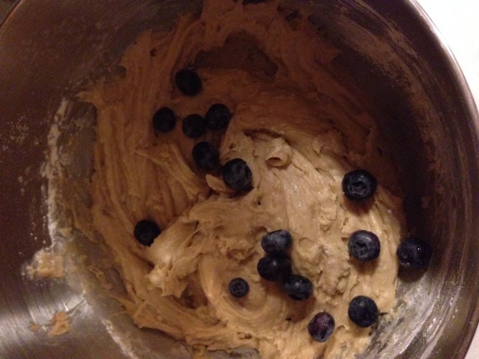 Start folding in the blueberries