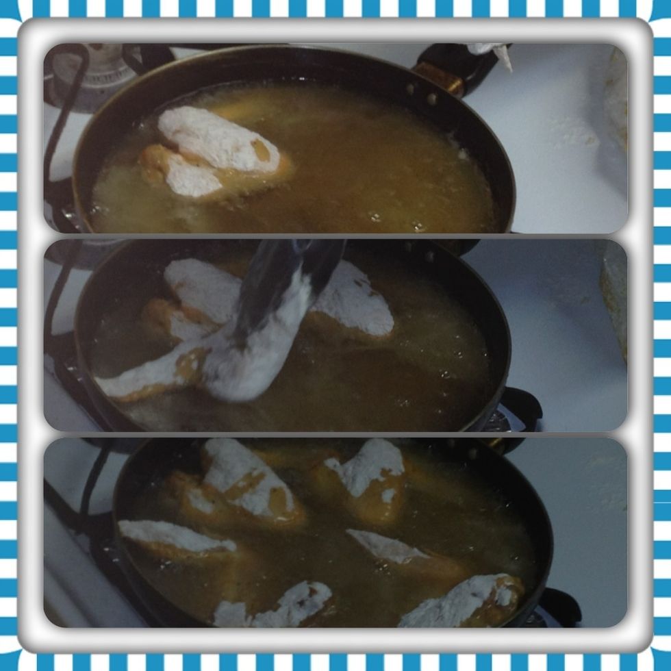 *start frying chicken but don't over crowd at least 15 to 20 mins till golden brown.. Poke with folk to make sure it's not red inside..