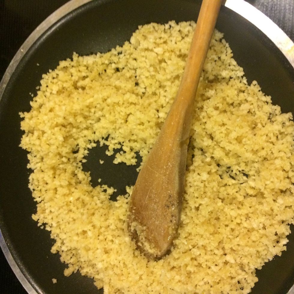 Start frying the breadcrumbs  with olive oil , cumin, onion powder, garlic powder and salt/ pepper