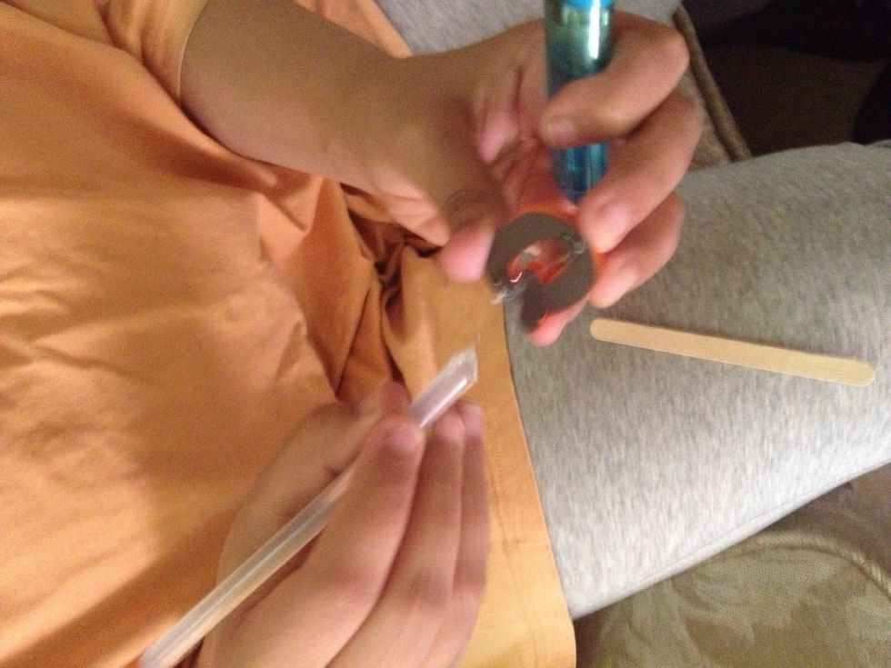 Start glueing the alphapet to the ice cream sticks