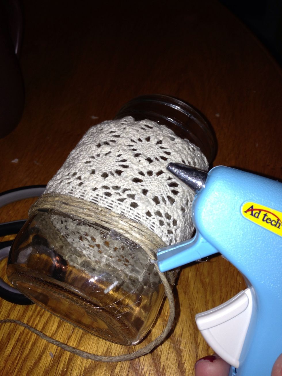 Start glueing the hemp against material to start up a straight line! Put a small amount of glue on every side of mason jar below where you will wrap hemp around. It will become easier with time.
