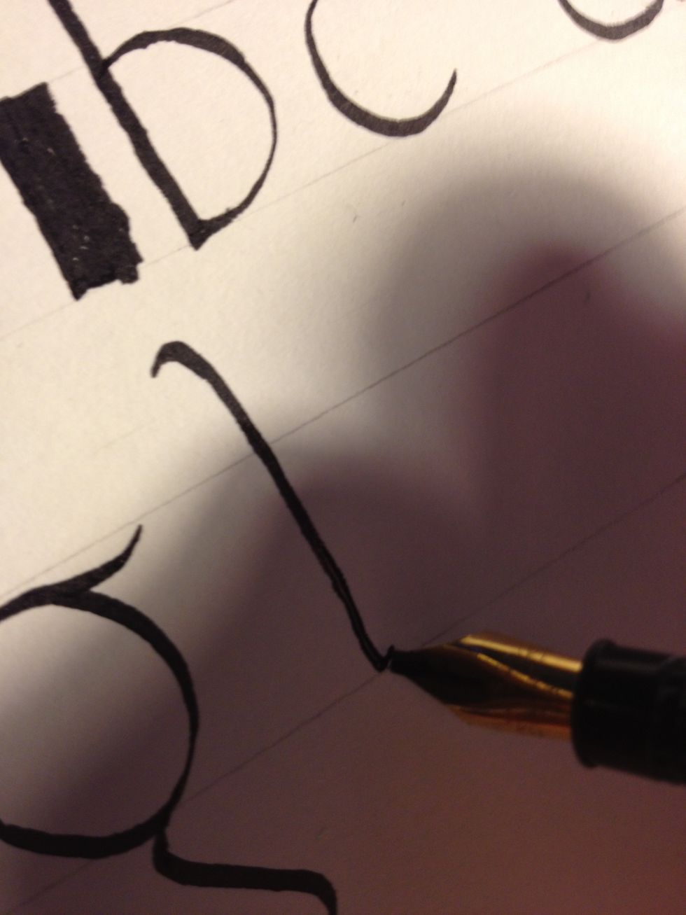 Start "h" by creating a basic trunk, with a tic at top and bottom.