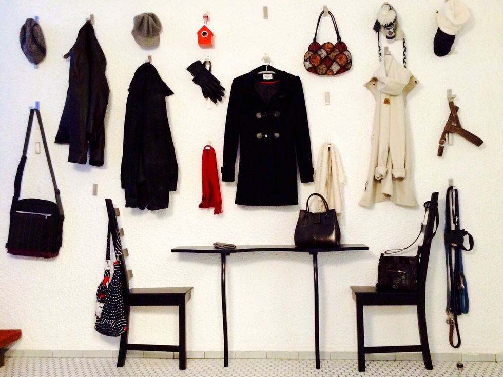 Start hanging things on the hooks. Only unfold the hooks that you actually use.