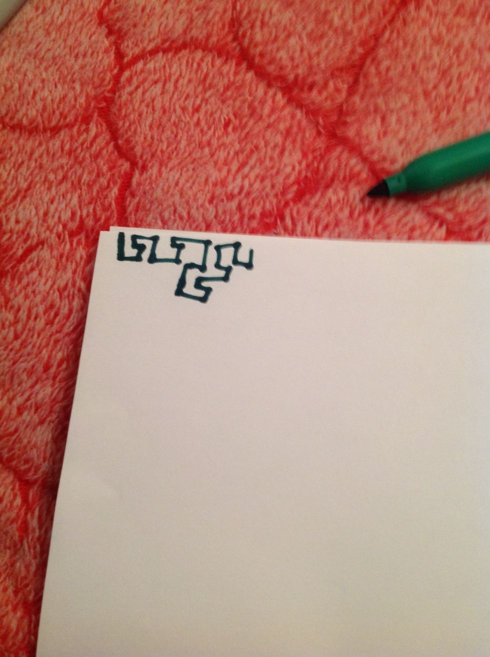 Start in a corner and make a beginning square pattern.