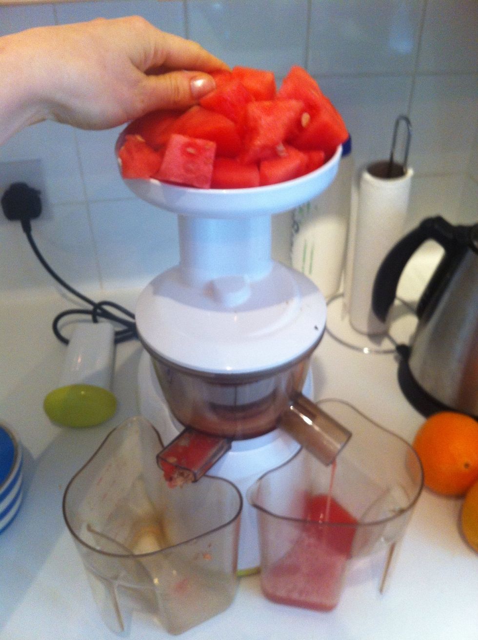 Start juicing! For those of you without one of these don't worry! You can also blend every thing in a blender with a little water to get it going and then strain out the pulp! :-)