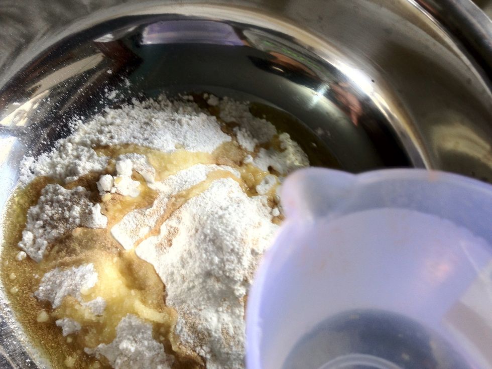 Start kneading and gradually add some water. If you find it too sticky, just add a little bit of flour