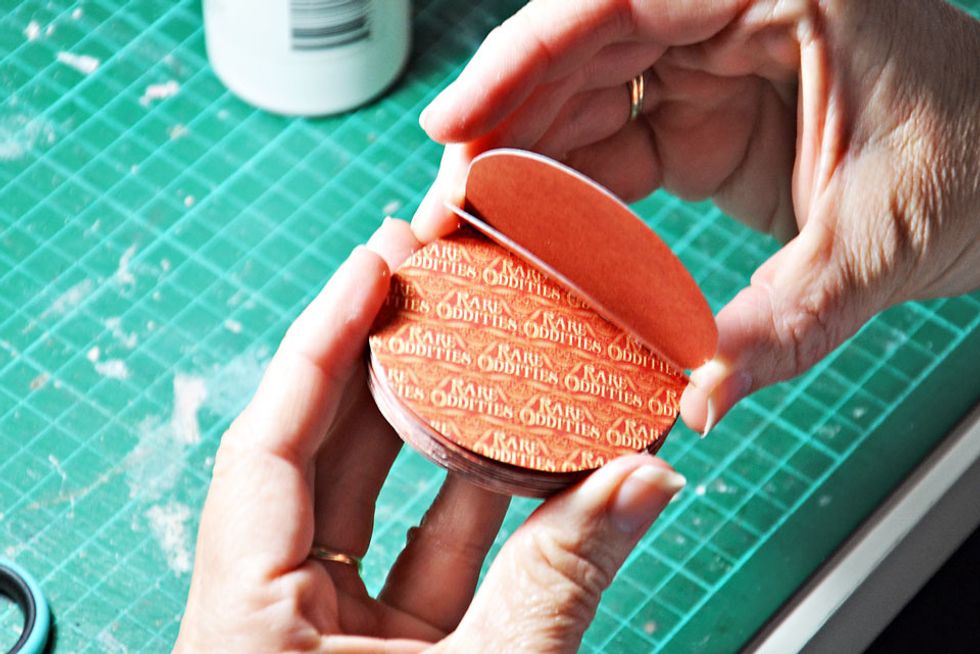 Start layering folded pumpkin pieces glueing only along the folded edge.