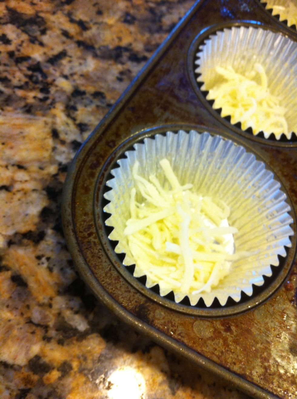 Start layering with what you would like in your egg: cheese