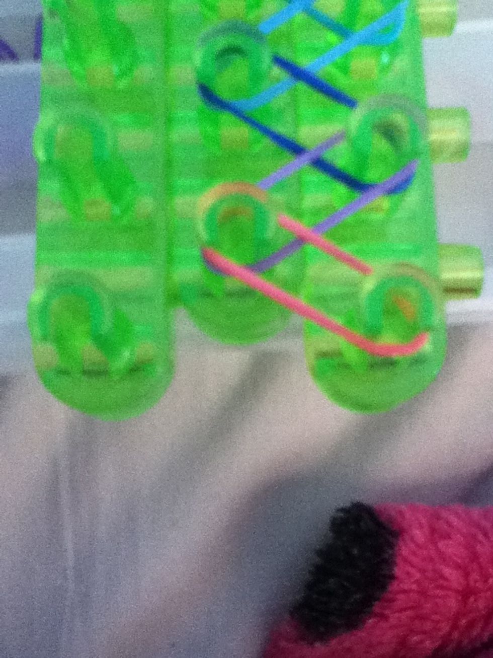 start loom the bandz the same way as u placed them. if u dont know how to loom the bands, look on youtube!