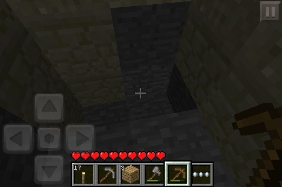 Start making a mine downward in you house, and head up once you've collected some cobblestone