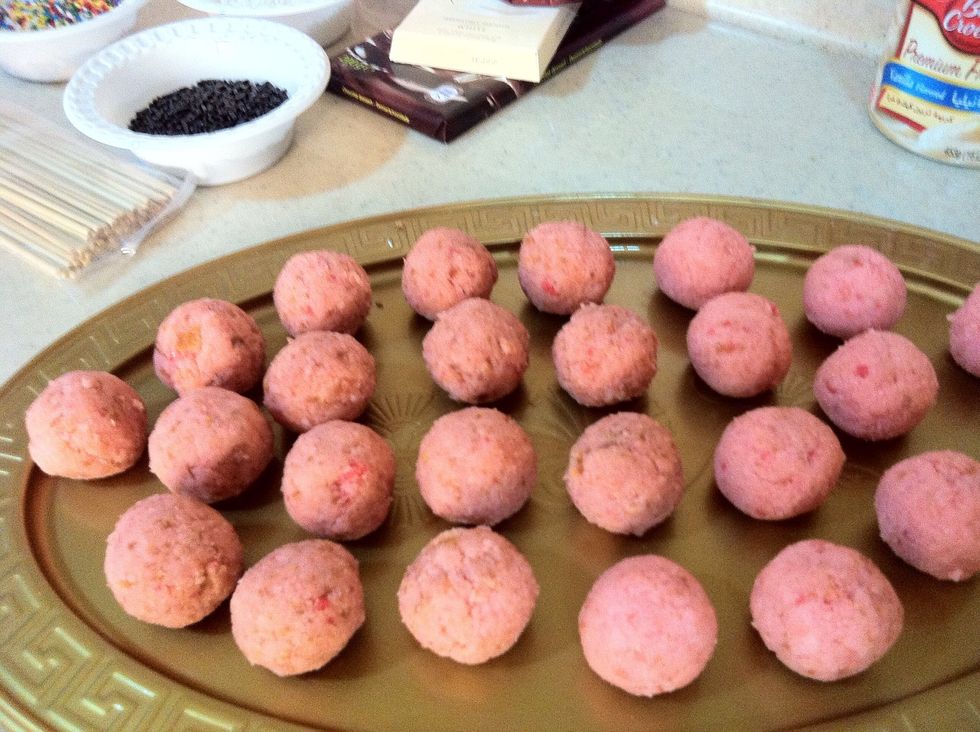 Start making small circles or whatever size you wish .. But make sure they have the same size ,, after finishing .. Put them in the fridge for 15-30 minutes