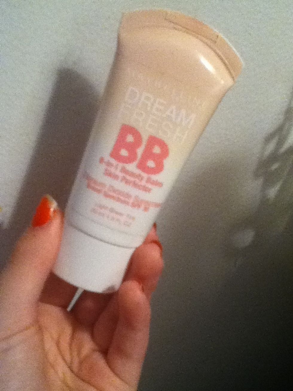 Start of with a bb cream, it is lighter than foundation and tinted moisturizer. I am currently using Maybelline's Dream Fresh BB cream in their lightest shade.