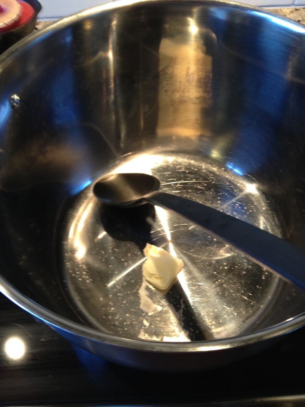 Start off by melting the butter or coconut over medium heat.