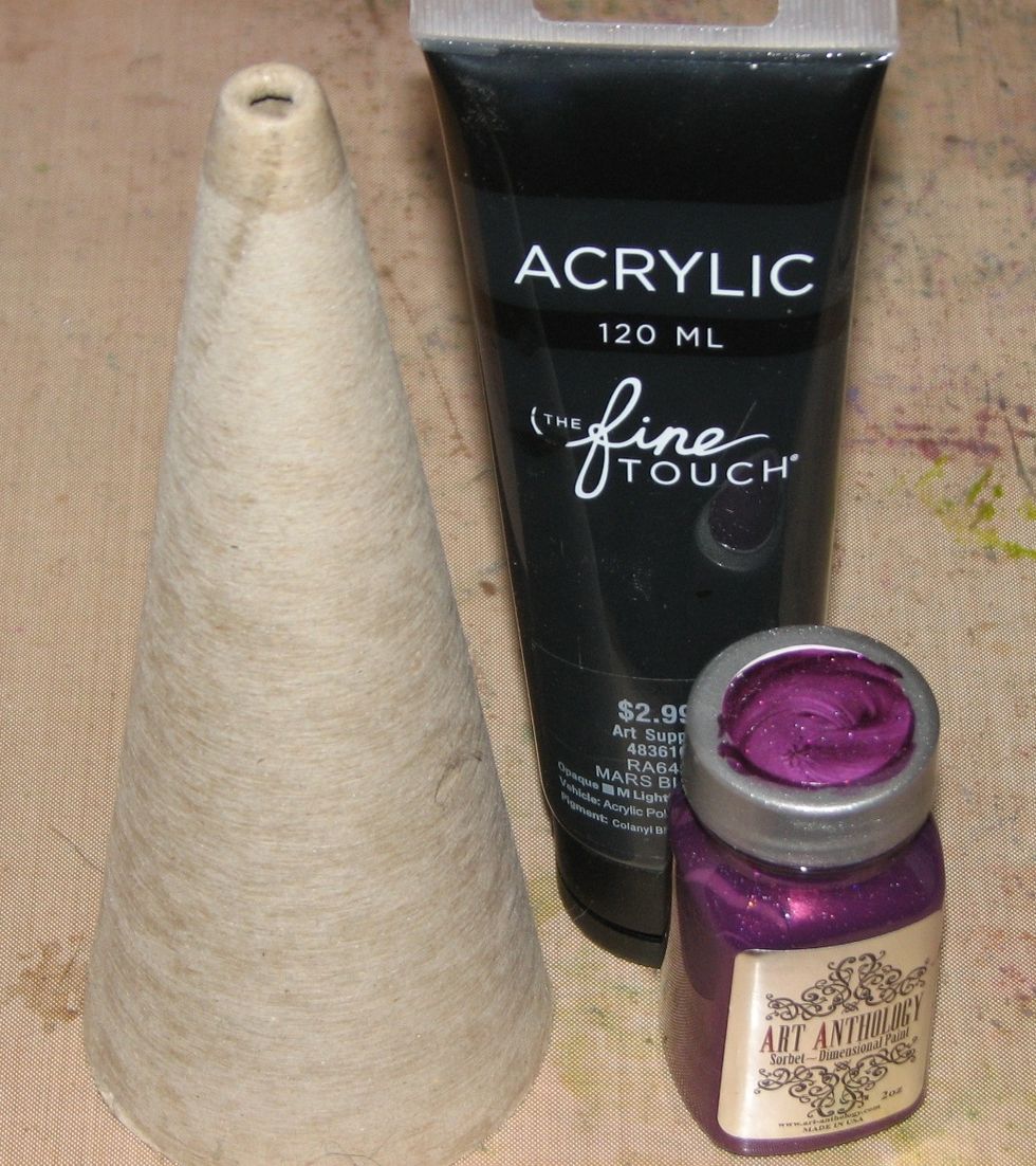 Start off by painting the cone with a coat of black acrylic paint.  This is just insurance in case you miss a spot or two in later steps.