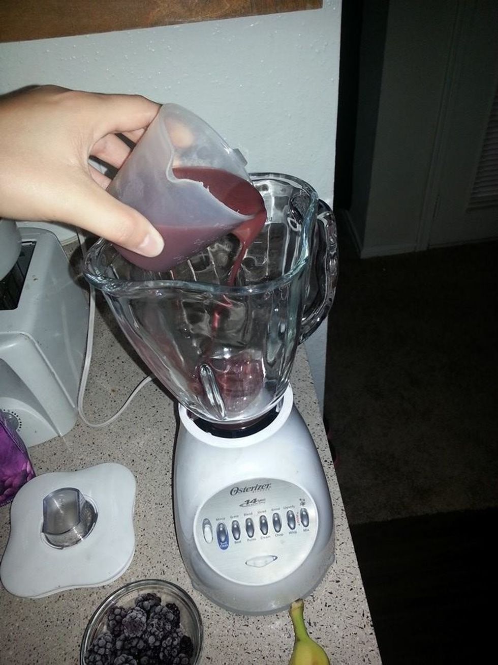Start off by pouring the acai juice into the blender (1 cup)