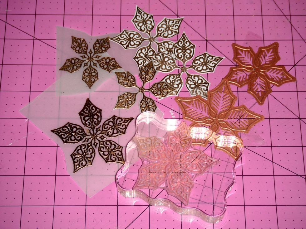 Start off by stamping & cutting poinsettias in different sizes on white cardstock and vellum. (I heat embossed & foiled the images in gold to add more shine to them.)