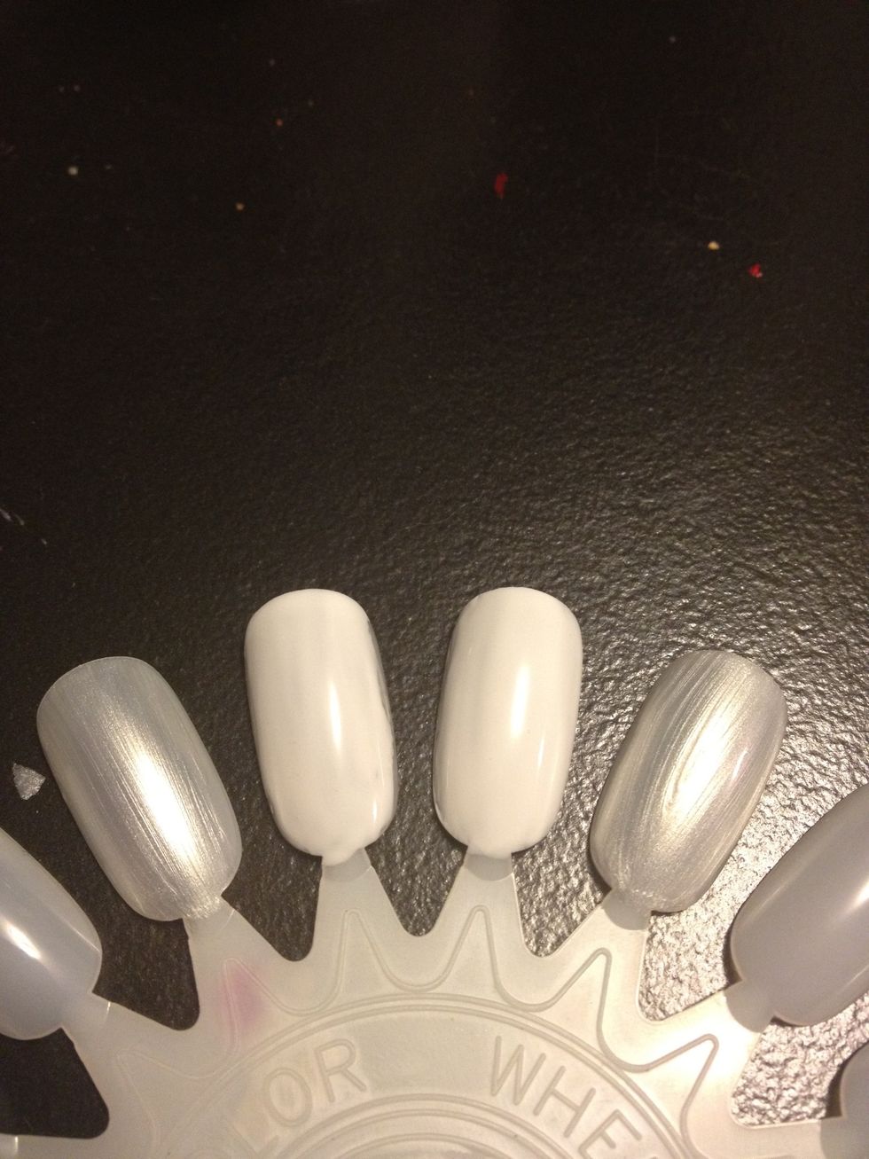Start off with a base coat. I chose white, and a sheer white so the tattoo will pop off the nail more :)
