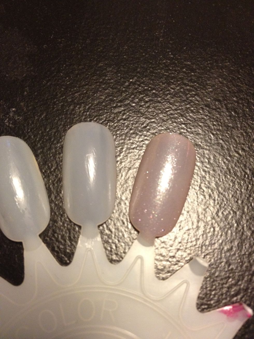 Start off with a base coat. The one on the left is a clear base coat, right is a sheer pink :)