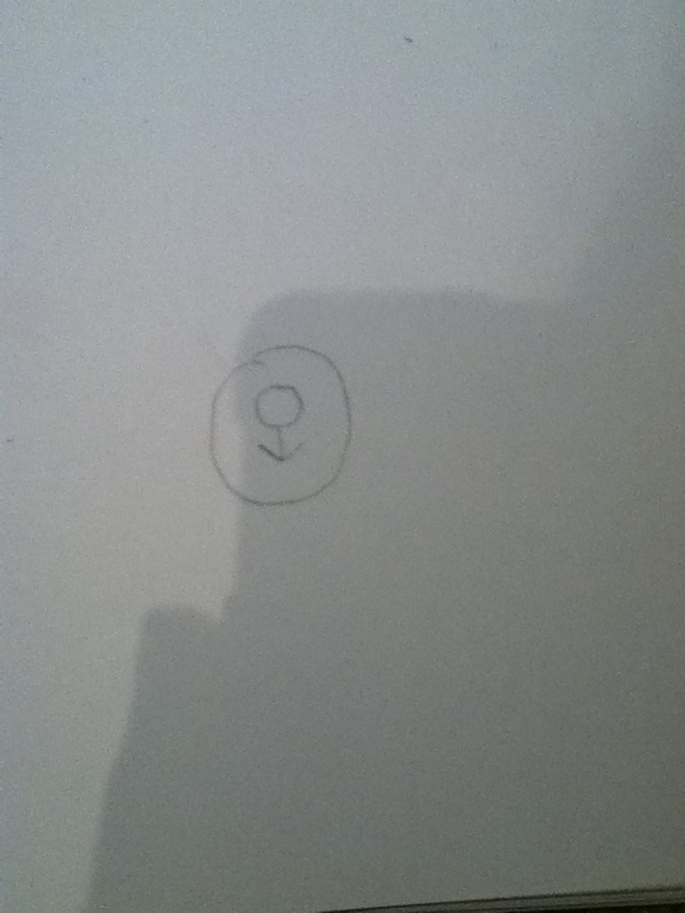 Start off with a circle ( this will be the snout) and draw a stick figure person without any legs in the middle.