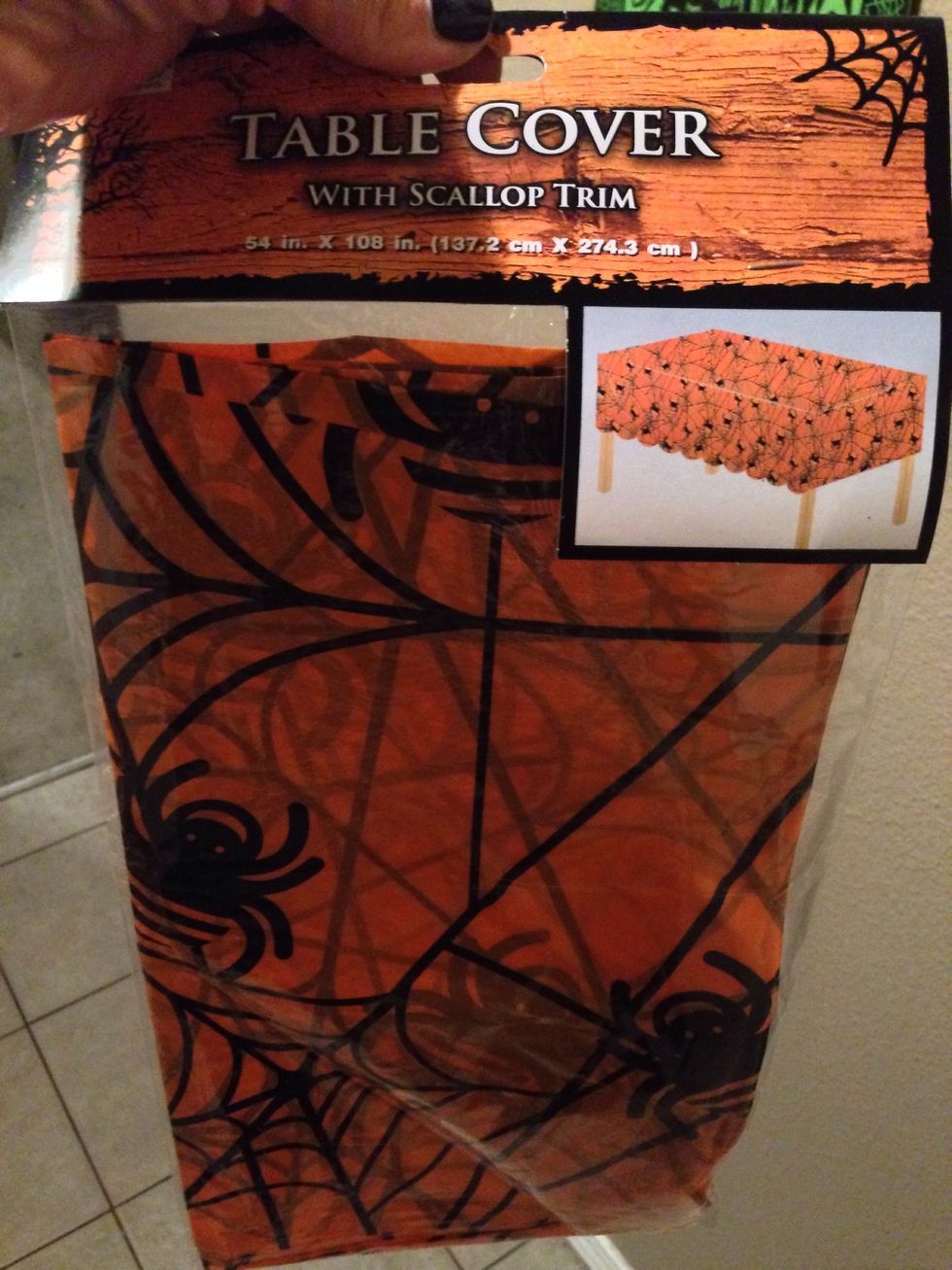 Start off with a Halloween themed tablecloth