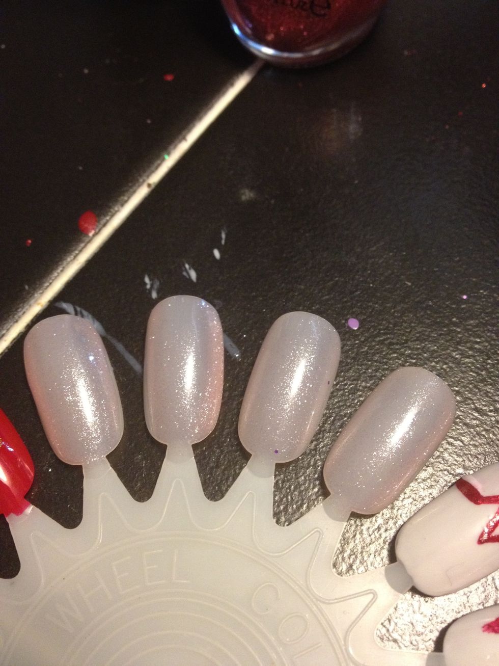 Start off with a sheer pink base coat