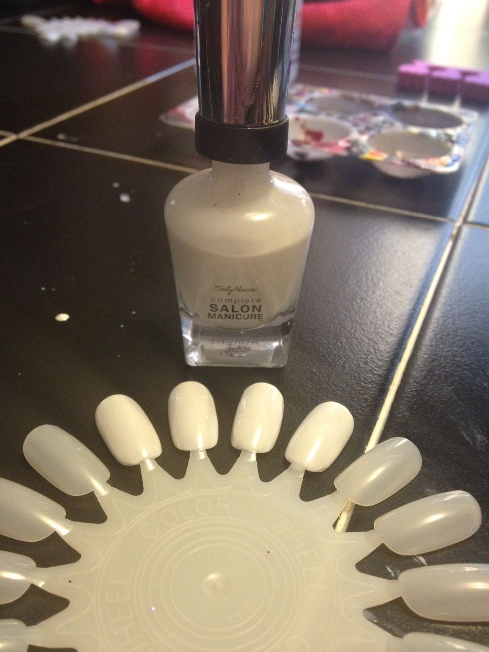 Start off with a white base coat. I'm using Sally Hensen 120 Polar Bare. It's very sheer, so you may need 2-3 coats for an opaque color.