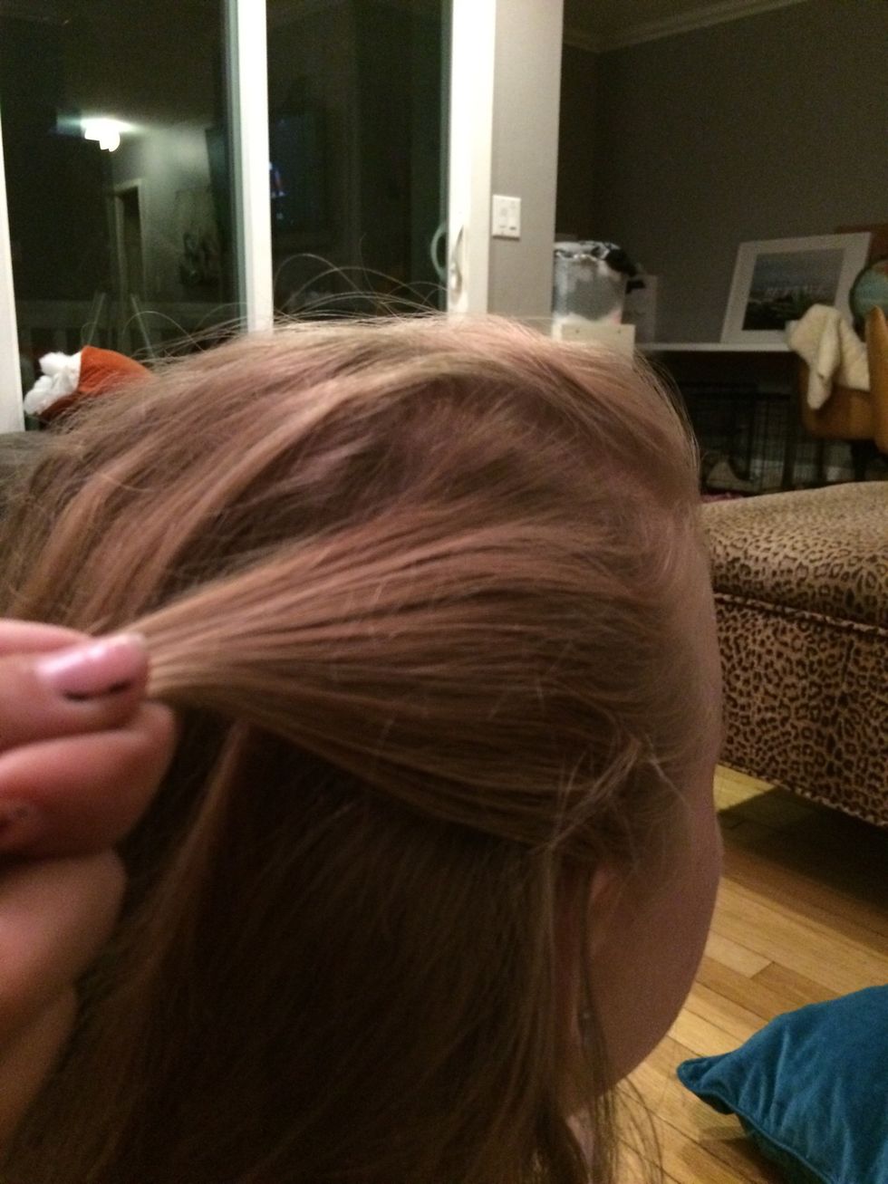 Start off with strand of hair on the Side