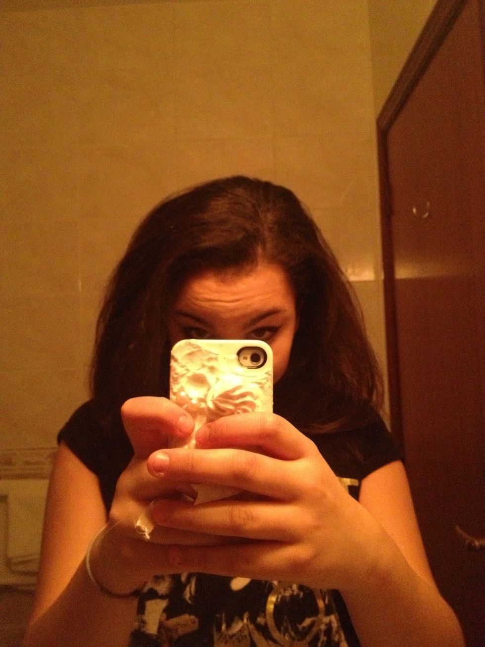 Start off with your hair in a side parting