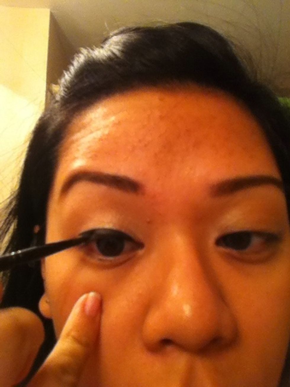 Start on the inner corner and slowly work outward. I find it easier if I hold the eyelid while doing this so it's easier to control.