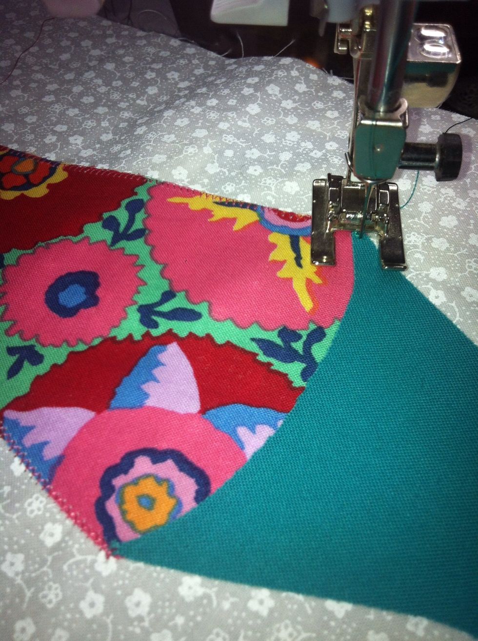 Start on the next layer. Change thread to match. I like to start in a corner where a little thread build up is expected.