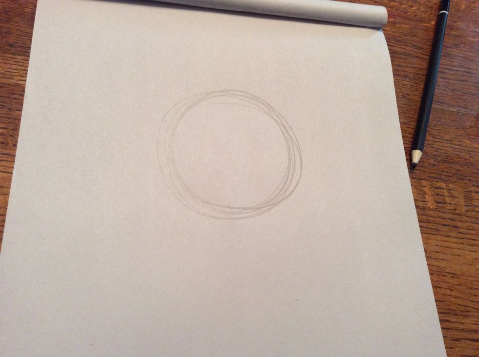 Start out with a big and light circle