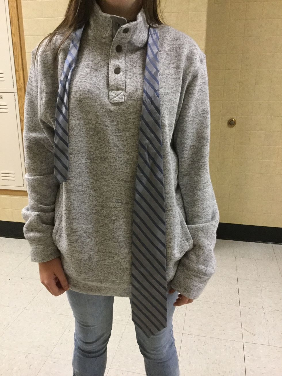 Start out with your collar popped and the fat side of the tie on YOUR left. Make sure the fat side of the tie is much longer than the skinny side.