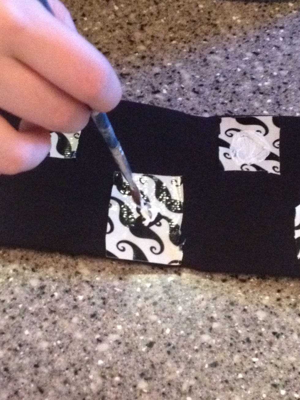 Start painting around the opening of the duct tape. Star from the bottom and work your way up.