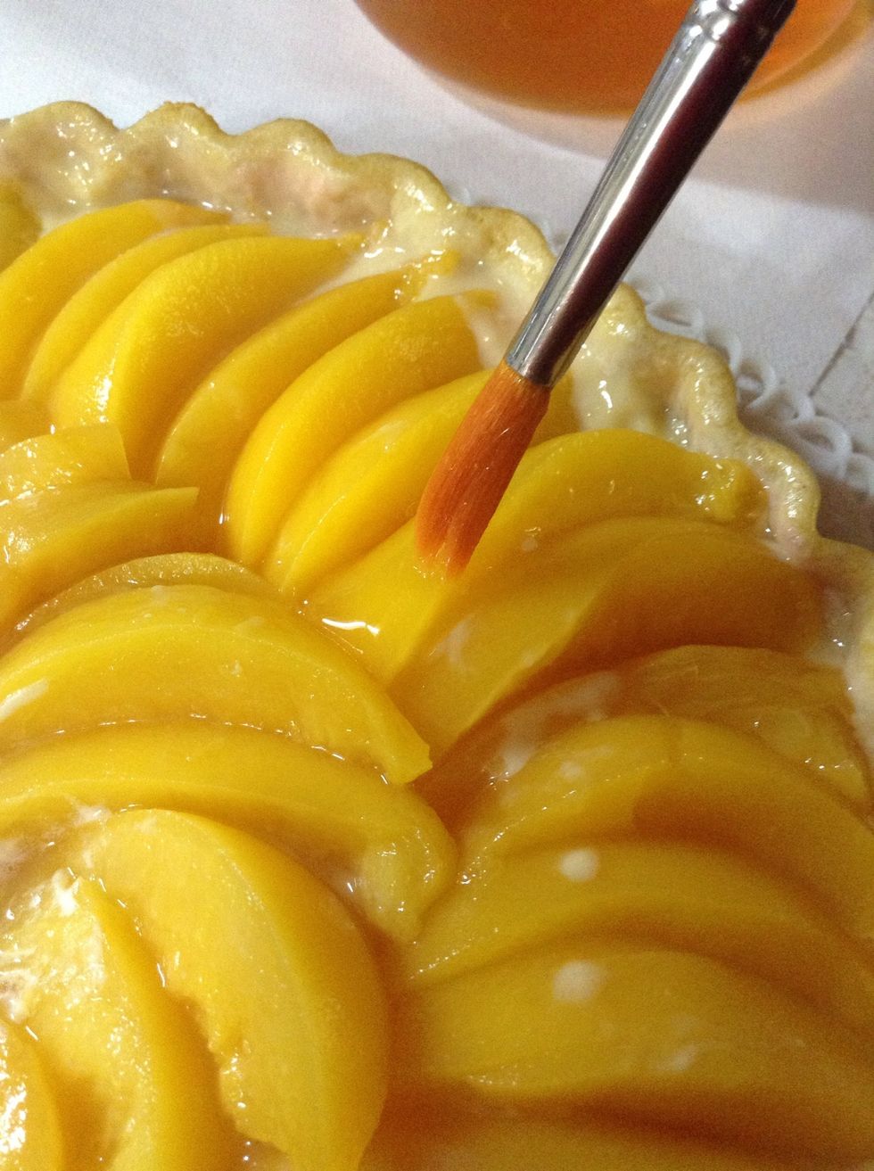 Start painting over the top of the pie.