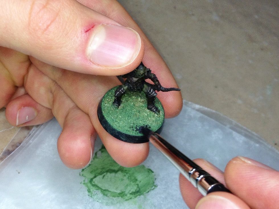 Start painting the base with the primer. This time you don't need to worry so much about working quickly.