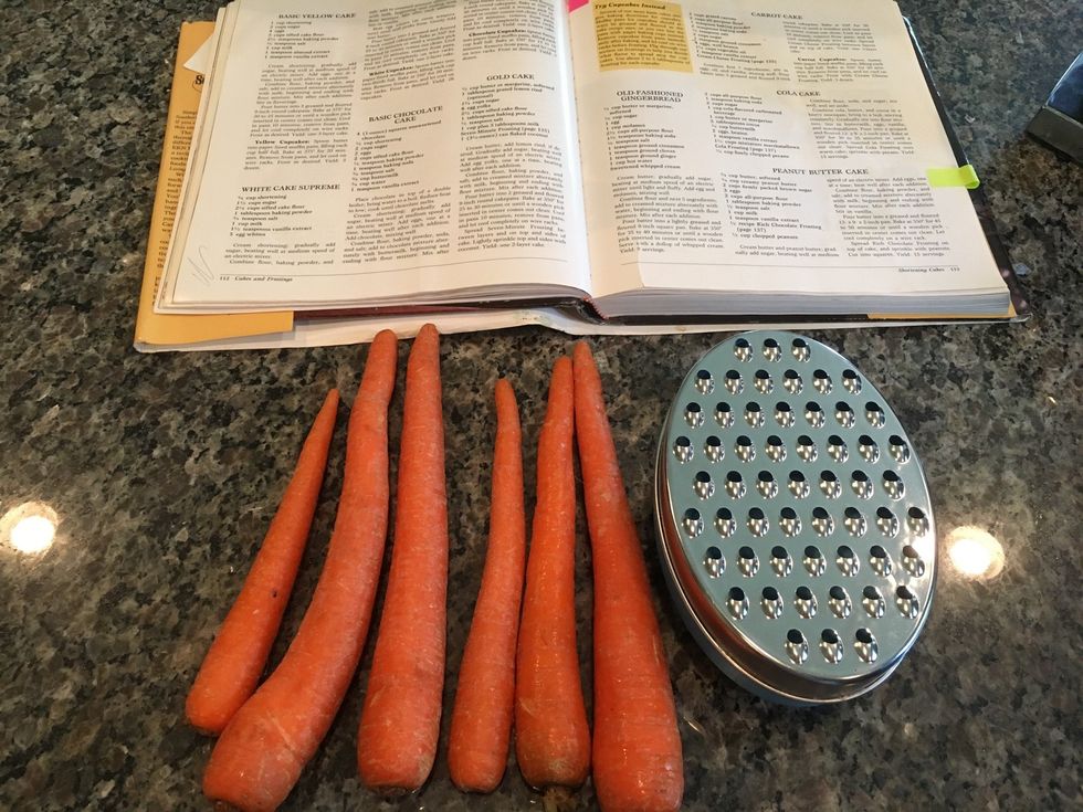 Start prepping your ingredients by washing off the carrots.