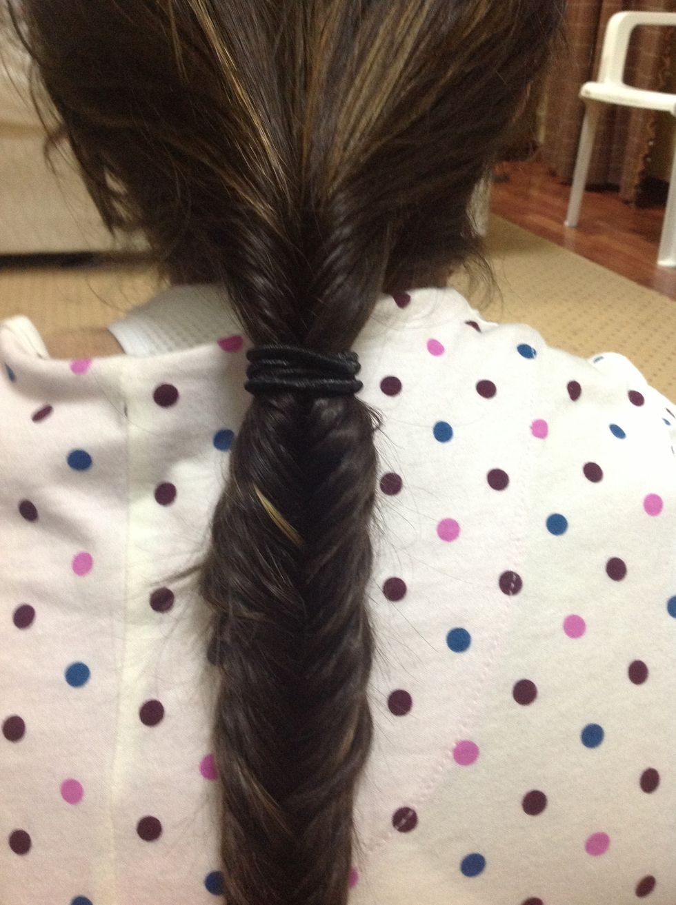 Start pulling out the hair tie that was used to make a pony-tail