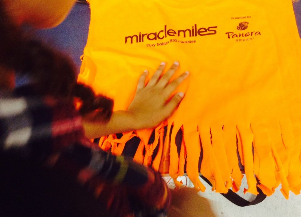 Start pulling the strips like so , so they look skinnier and longer.