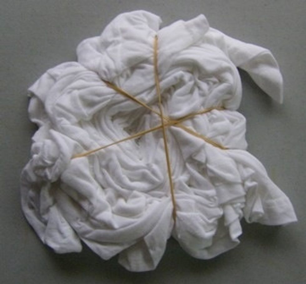 Start putting rubber bands around your shirt until you think it's is secure